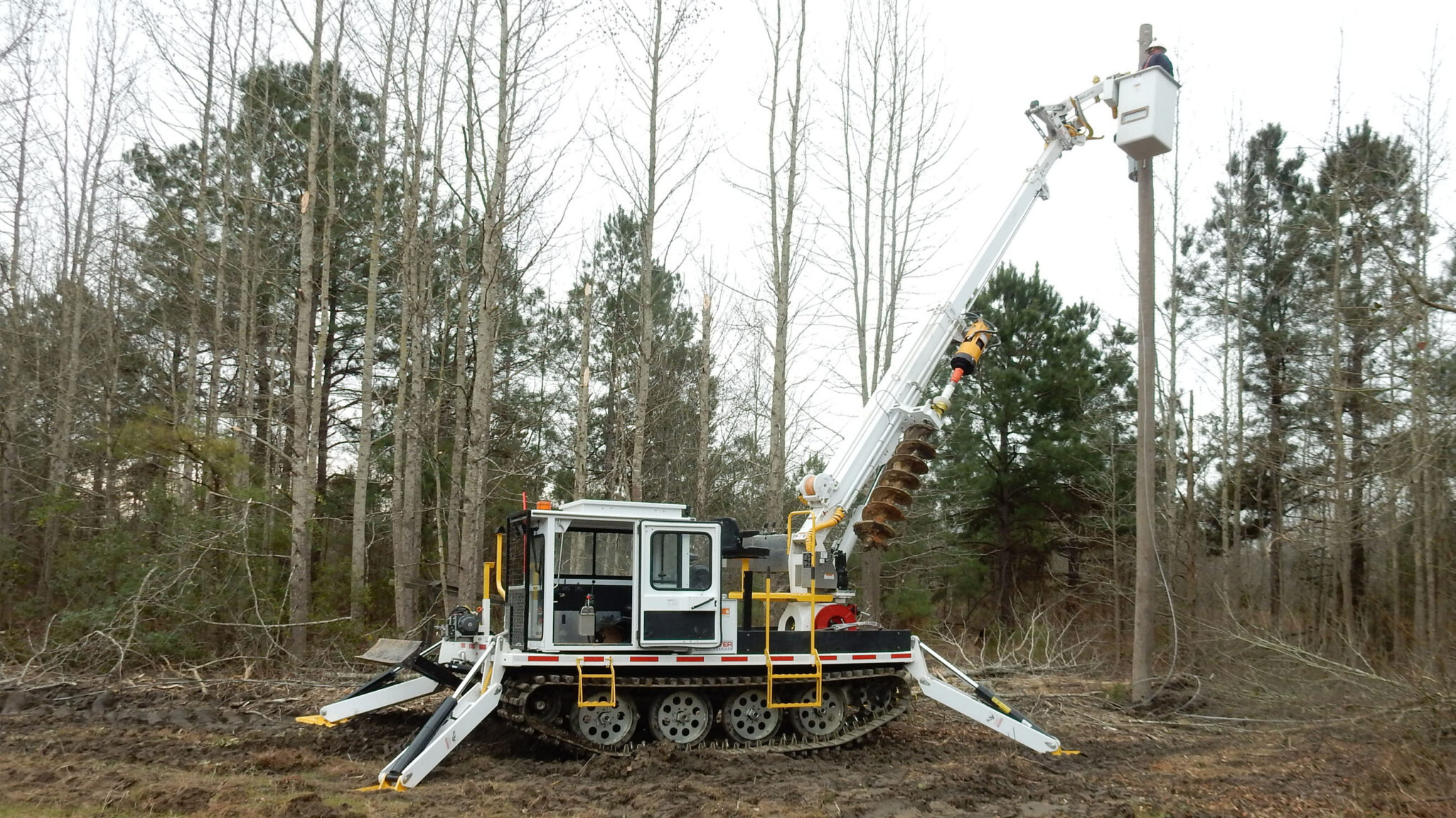 TrackMounted Digger Derricks Bucket Trucks and Towing Equipment